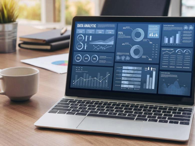 Business data analytics dashboard on a laptop